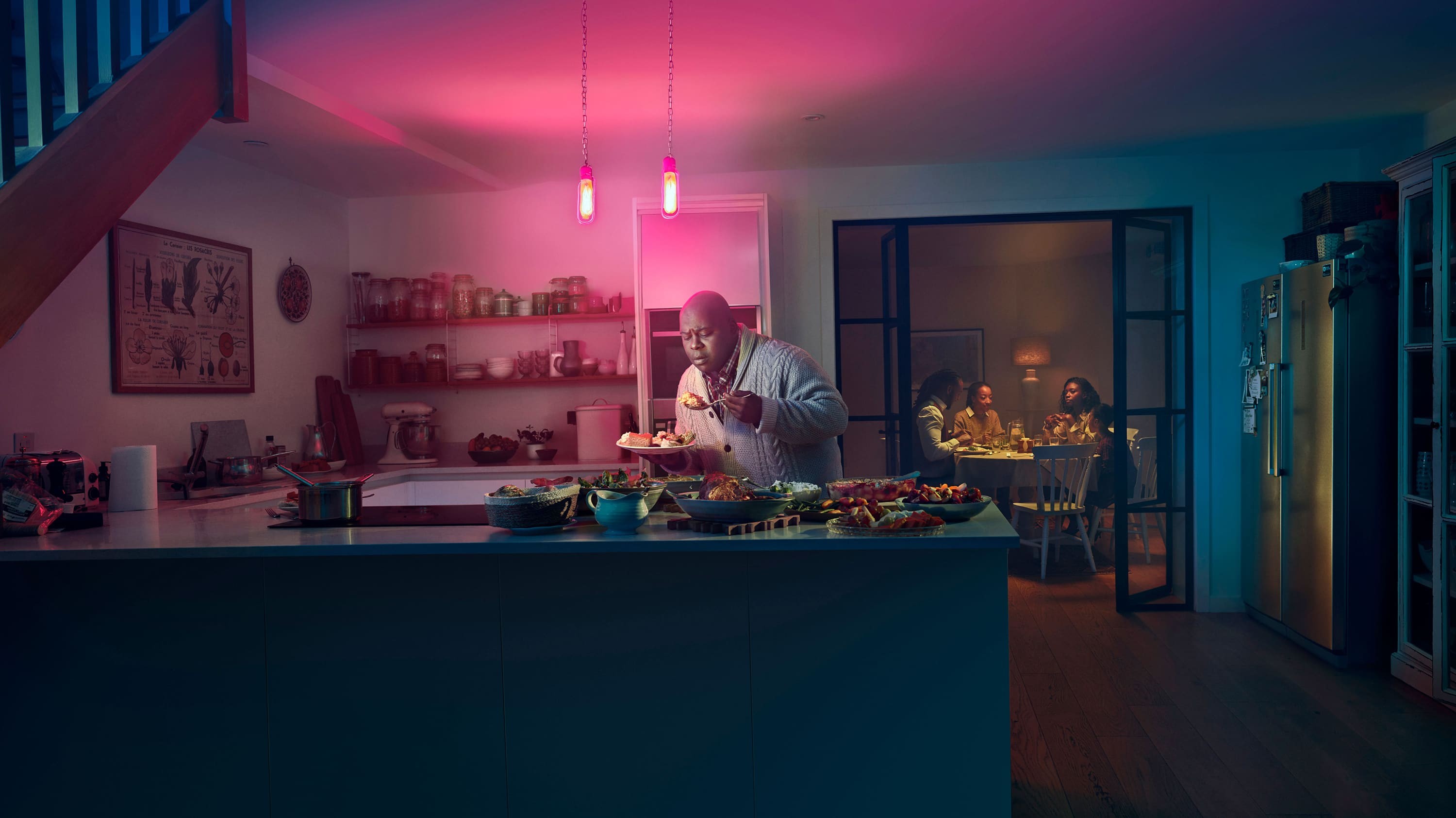 Family dinner scene. Image of brain that reads: MORE FOOD NOW. Actor portrayals.