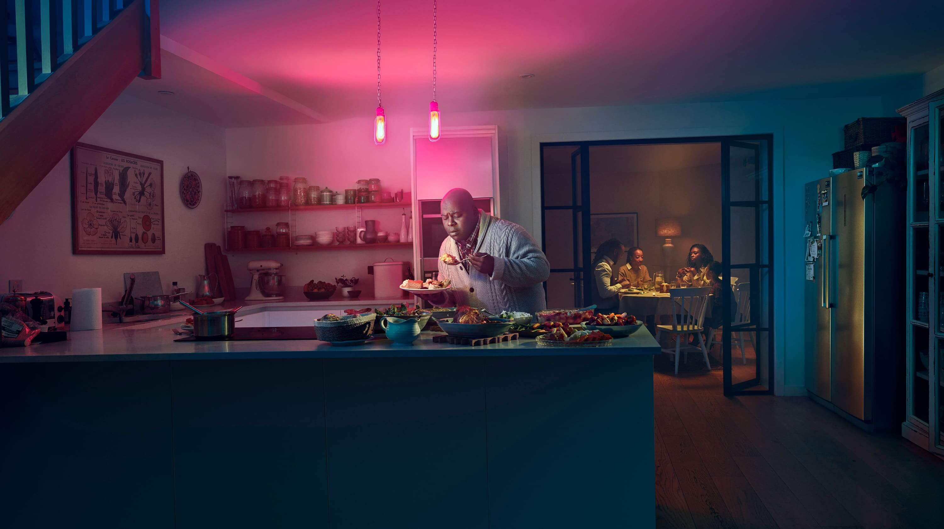Family dinner scene. Image of brain that reads: MORE FOOD NOW. Actor portrayals.